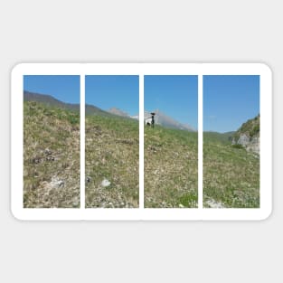 A static shot from the panoramic point Castaldia di Piancavallo of a black and white goat watching me. Beautiful nature in a spring sunny day; no people around Sticker